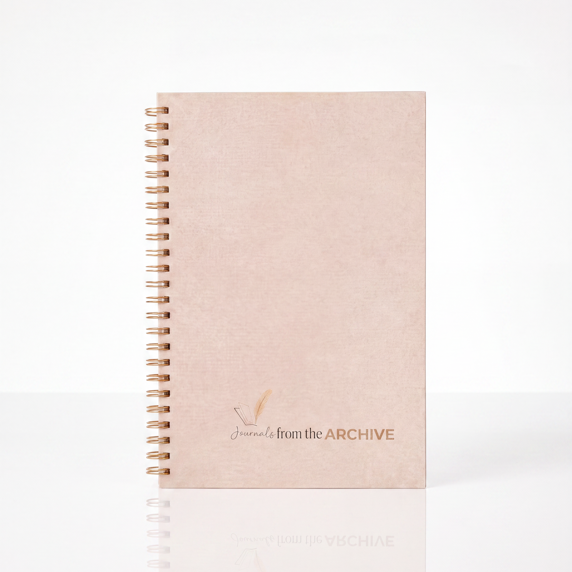 The Quiet Set — Warm Glow candle with cider and spice scent beside the Wood Journal, unlined pages, by INDI GLOW LIVING
