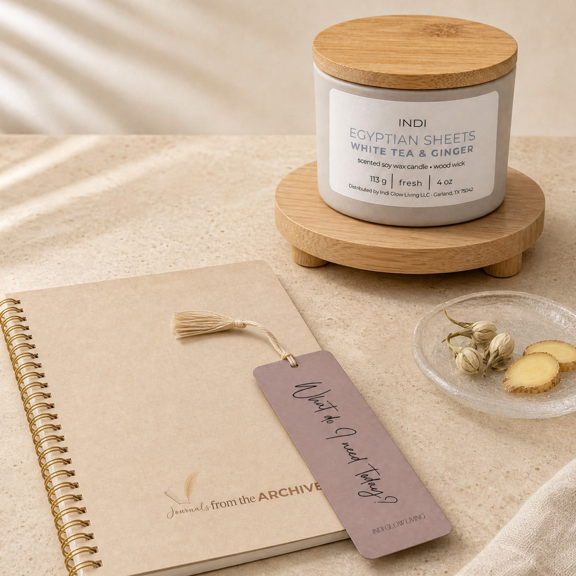 The Quiet Set — Egyptian Sheets candle with white tea and ginger scent beside the Linen Journal, lined or unlined pages, by INDI GLOW LIVING